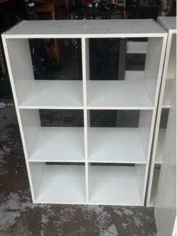 5 white shelves