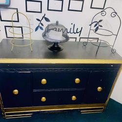  $180- 1 Black and gold Vintage dresser! Lots of storage space behind each side door. H-2‘10“ X L 4 ft 4 1/2” X D 1‘7“  Could use a repainting.  Comes
