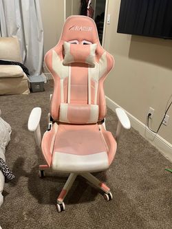 Pink gaming chair, not broken, works perfectly and pink