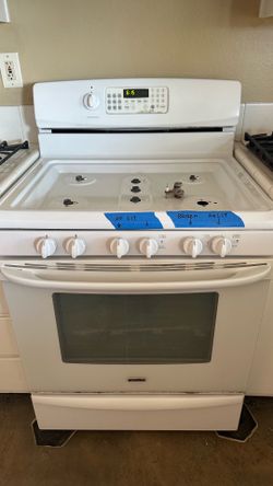 White Kenmore stove gas range