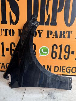 19-25. TOYOTA COROLLA RH FENDER PASSENGER SIDE