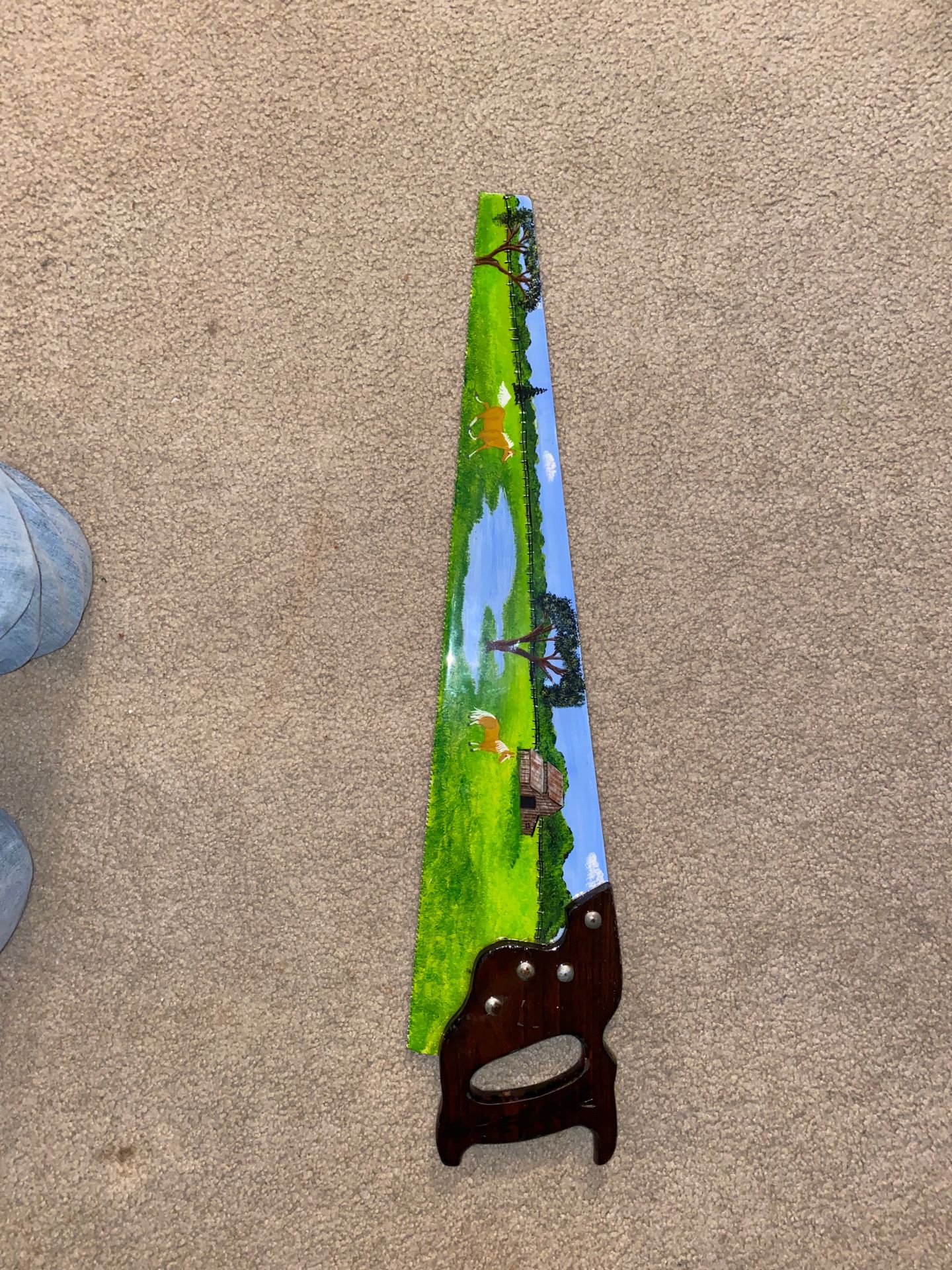 Beautiful hand painted antique saw