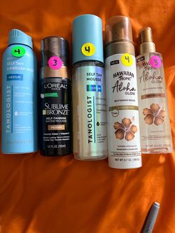 Sunscreen tanning sprays