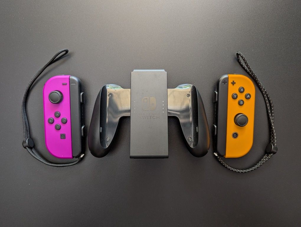 Nintendo Switch Joy-Cons & Joy-Con Grip (Neon Purple & Neon Orange)