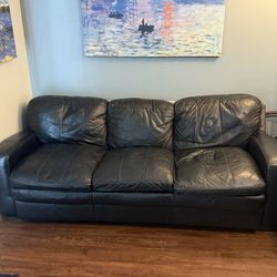Black Leather Sofa – Seats 3 $300