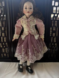 Antique porcelain doll from 1999