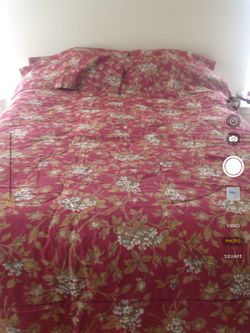 Queen comforter set with 2 pillow shams, reversible, flower print on one side stripes on the other. 86" x 86". Never used. Been in storage