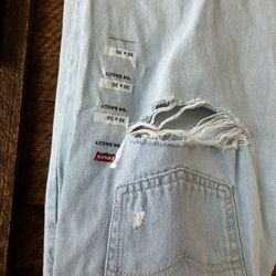 Light Washed Levi’s Distressed Denim