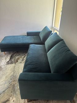 down filled teal velvet couch