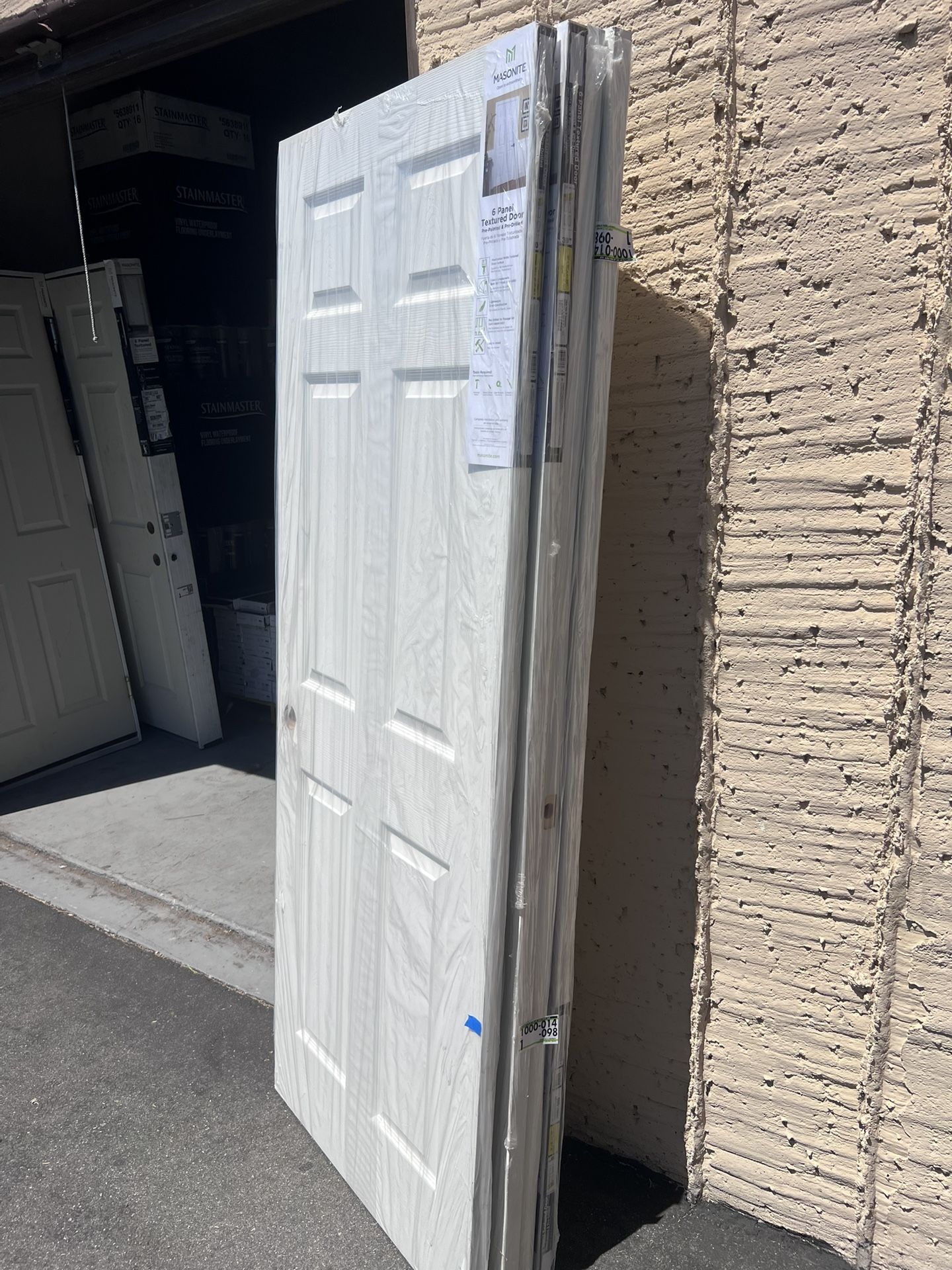 Masonite 30 in. x 80 in. Textured 6-Panel Bored Hollow Core Painted Composite Interior Door Slab
