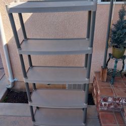 PLASTIC STORAGE RACK LIKE  NEW (CHECK PICTURES FOR MEASUREMENTS)