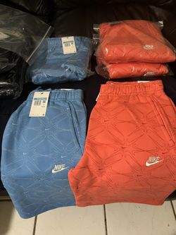 Men’s Nike sweat shorts 3large bright salmon and 2 medium baby blue reg 50$ for 30$ each