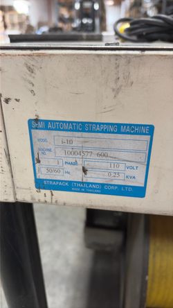Semi automatic strapping machine