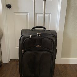 Suitcase. Clean. (length -25” width -16”,  depth 10/12 “) color black