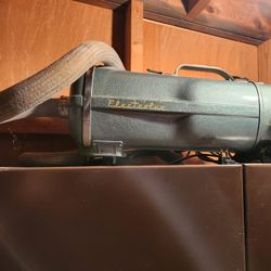 2 Antique Vacuums