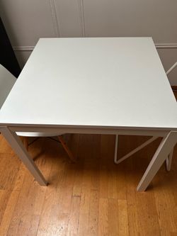 White dining table with two chairs $60