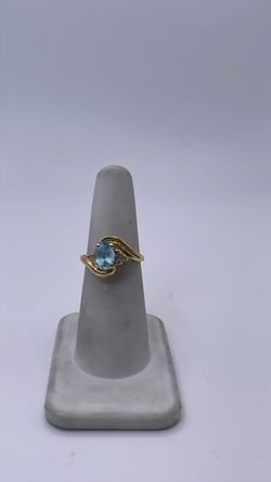 14k gold ring with blue CZ