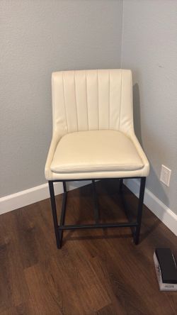 Cream colored counter height chair