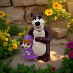 Masha la niña y los bancos de dinero del oso