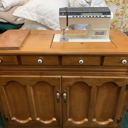 Singer sewing machine with custom cabinet