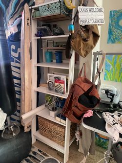 Angled wall storage shelf
