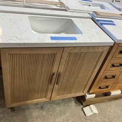 36” Bathroom Vanity in teak , single sink soft close solid wood with vanity top in white  $619  Luke’s liquidations warehouse Address:  2434 N Forsyth