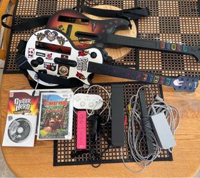 Nintendo Wii Console Bundle with Guitar Hero Guitars and Games