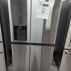 LG 27 Cu.Ft. Side X Side Refridgerator W/Ice And Water In Print proof. 1 Year Warranty