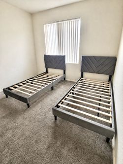 2 gray twin size bed frame