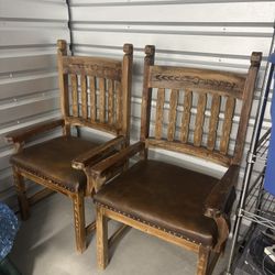 Large handmade wood and leather arm chairs