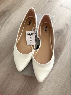 Women white flats size 8.5