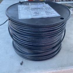 500-foot spool of 12 AWG stranded black copper building wire rated for commercial