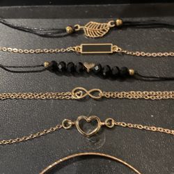 Black And Gold Colored Bracelets 