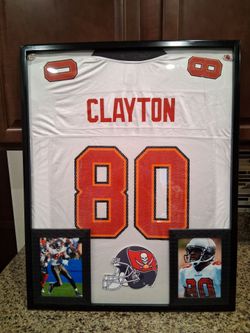 MICHAEL CLAYTON OF THE TAMPA BAY BUCCANEERS AUTHENTIC,BRANDED FRAMED JERSEY.
