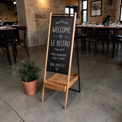 Modern freestanding chalkboard with built in wooden storage tray