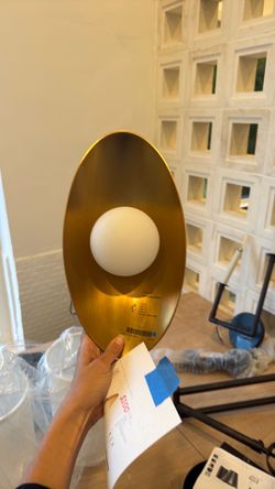 Gold sconce light