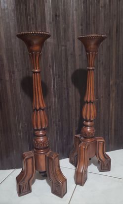 2 tall carved wood candle holder