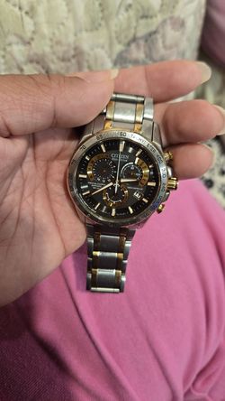 Citizen Men's Eco-Drive PCAT watch, specifically model AT4004-52E.