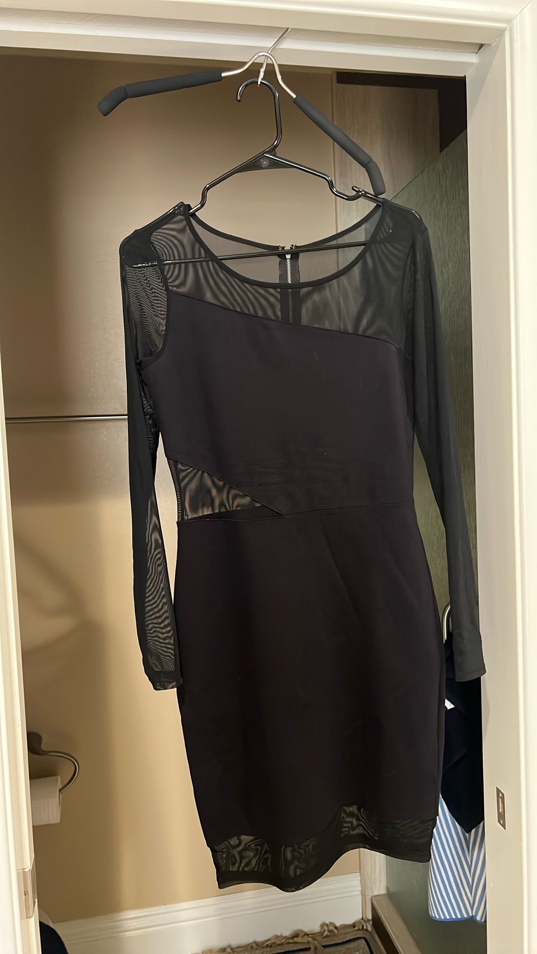 Woman’s Black Dress