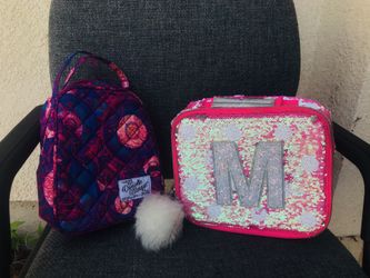 2 girl lunch boxes the one with the m is reversible from justice! $7 each