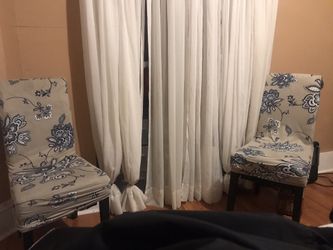 2 chairs with covers