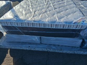 Brand New King Size super Pillowtop mattress and box spring free delivery depends on location