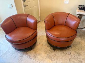 Pair Leather Swivel Chairs