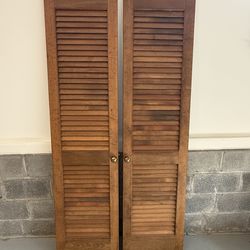 Louvered wooden swing doors