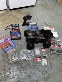 Gently Used Traxxas Stampede 4x4 Vxl Brushless Motor 2/3 Cell Battery EZ Peak Plus Fast Charger