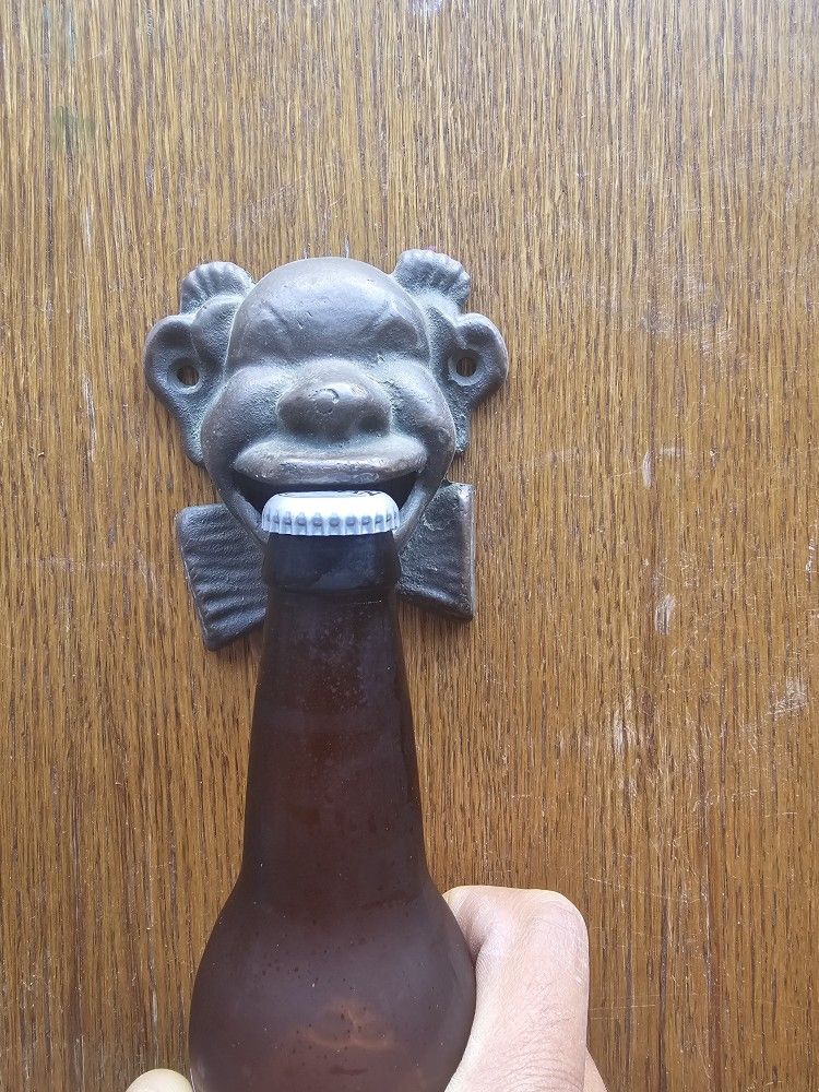 Antique Bottle Opener - Cast Iron