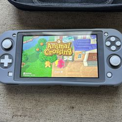 Nintendo Switch Lite w/ games for sale