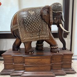 Anglo-Indian rosewood elephant with bone and mother-of-pearl inlay.