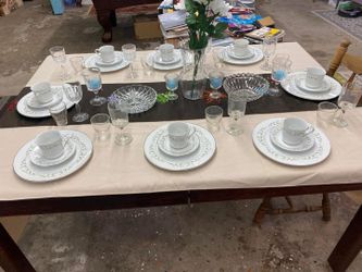 Eight piece table setting with Sheffields Fine Chine “Elegance” plates, saucers and cups