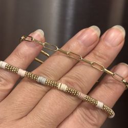 2 Golden Tone Bracelets